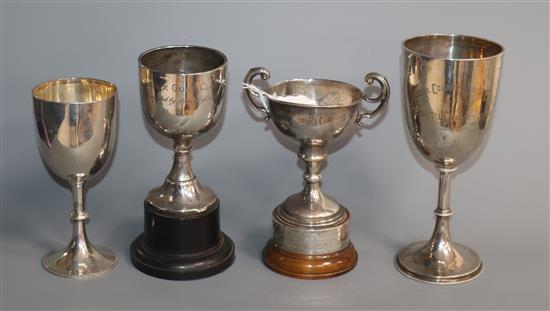 Four assorted silver trophy goblets/cups,, including two Victorian, (a.f.), tallest 17.6cm.